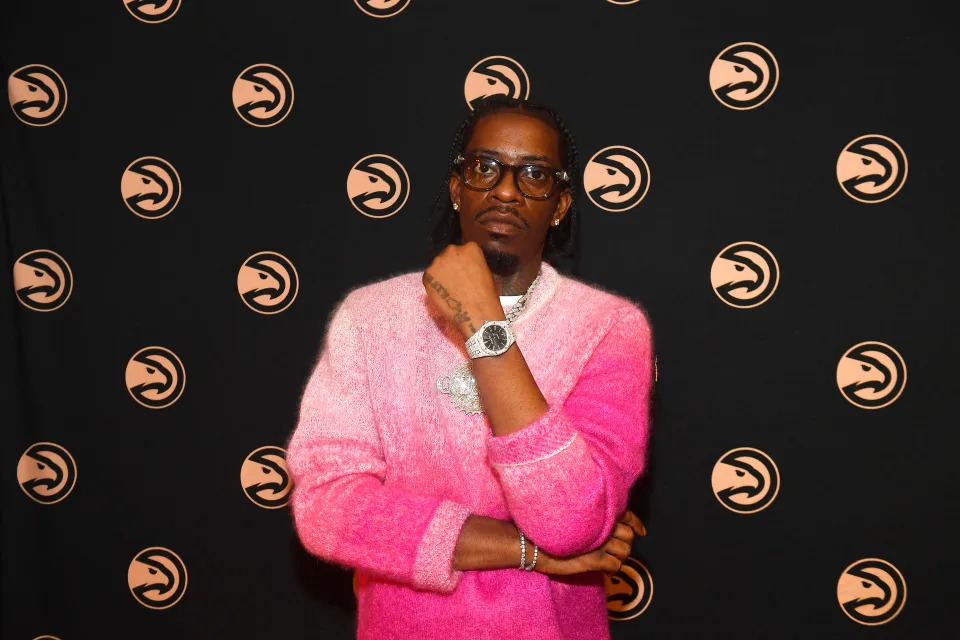 ATLANTA, GEORGIA – APRIL 07: Rapper Rich Homie Quan attends the game between the Philadelphia 76ers and the Atlanta Hawks at State Farm Arena on April 07, 2023 in Atlanta, Georgia. (Photo by Paras Griffin/Getty Images)