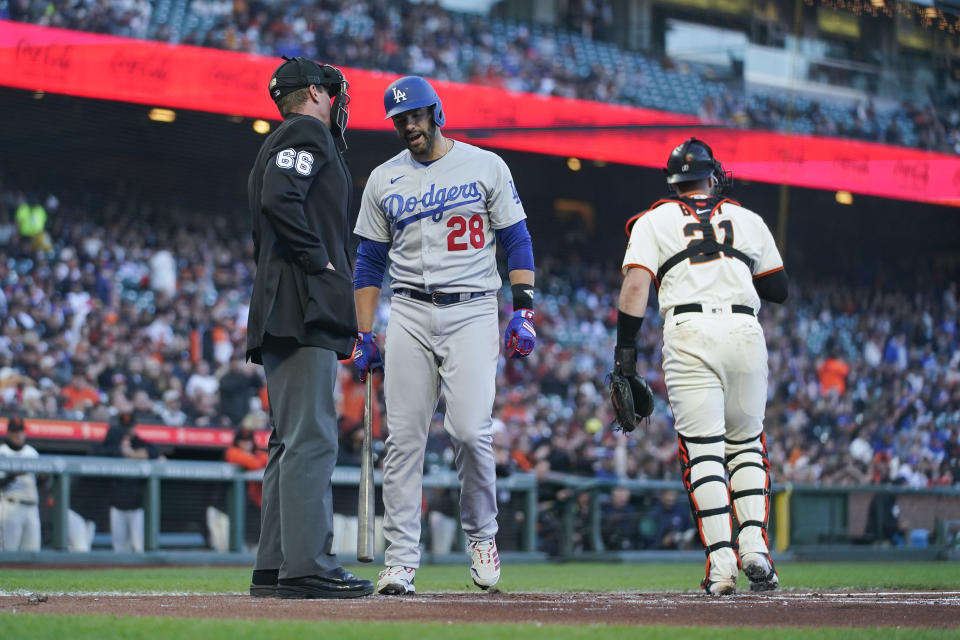 Los Angeles Dodgers' J.D. Martinez (28) reacts after striking out against the San Francisco Giants during the first inning of a baseball game in San Francisco, Wednesday, April 12, 2023. (AP Photo/Godofredo A. Vásquez)