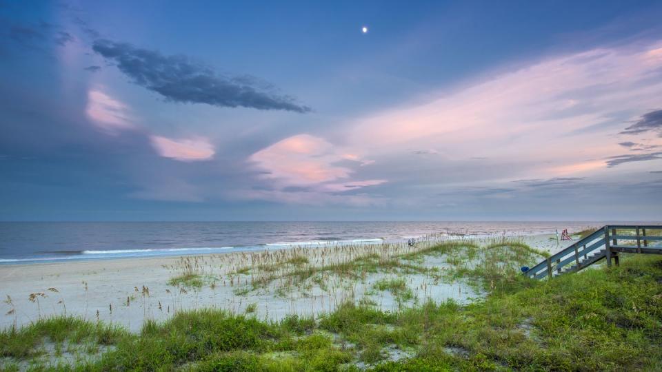 view of beach against a blue sky