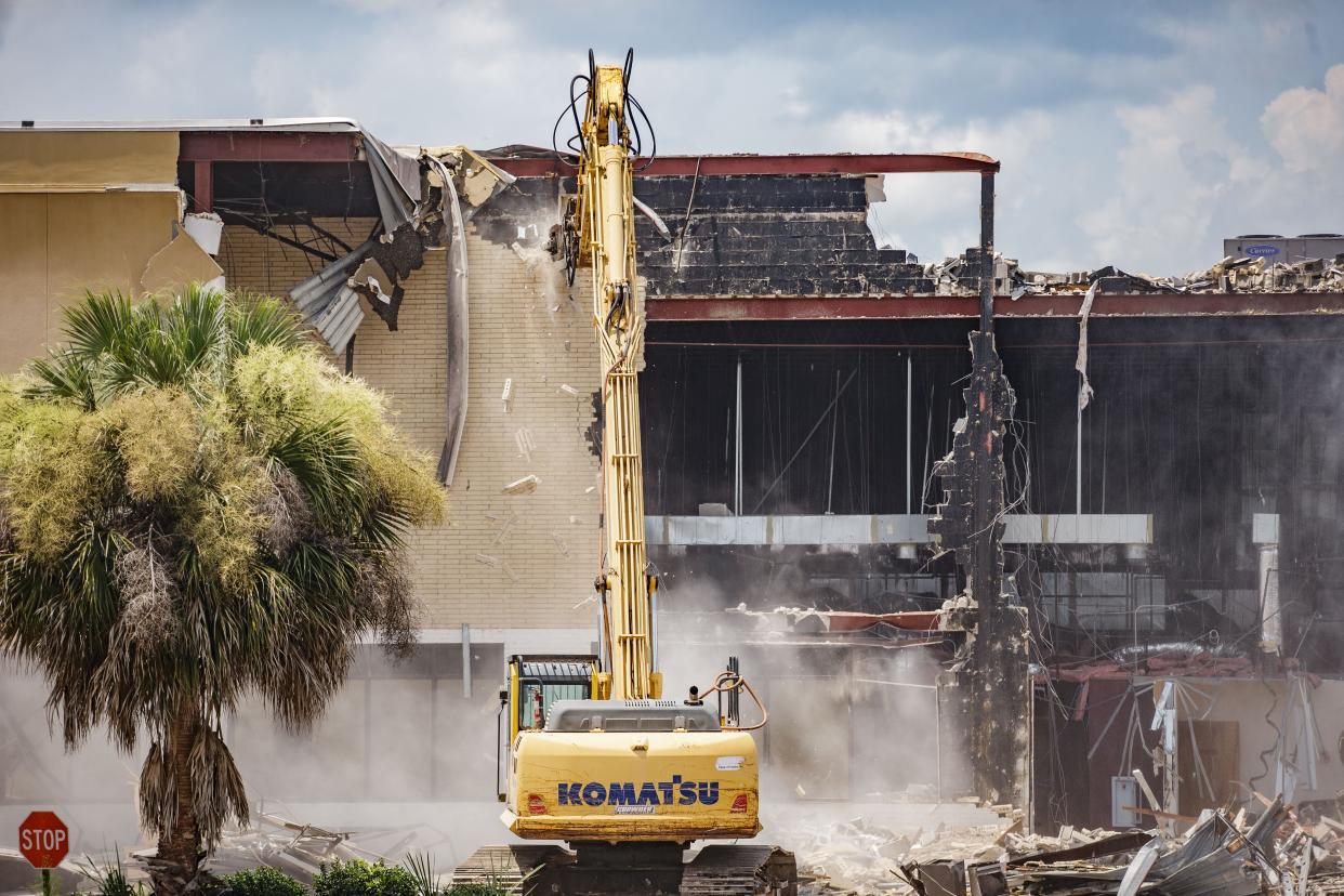 A crew begins the process of demolishing the Northwood Centre to make way for the new Tallahassee Police Department headquarters Tuesday, Aug. 10, 2021. 