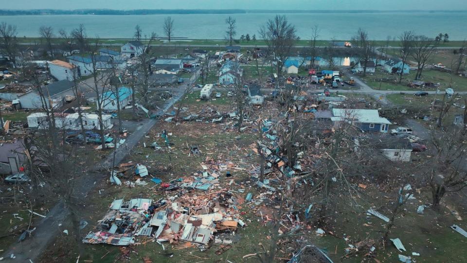 PHOTO:  Damage from tornadoes is revealed in the morning light after tornadoes ripped through the Indian Lake area of Logan County, Ohio, March 14, 2024. This photo taken Friday, March 15, 2024 about 8 AM. (Doral Chenoweth / USA Today)