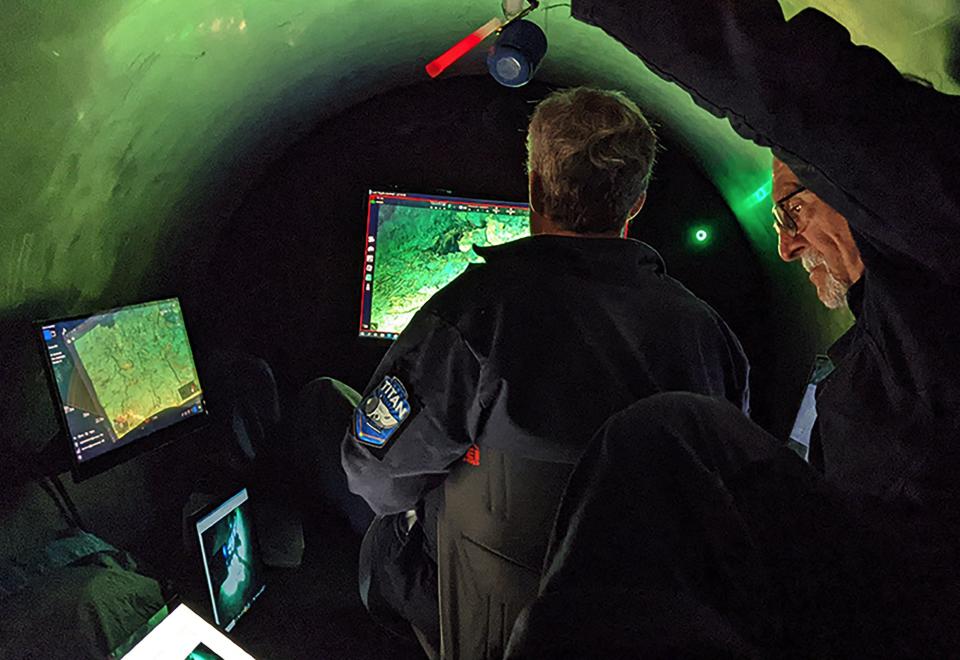 Two crew inside a submersible