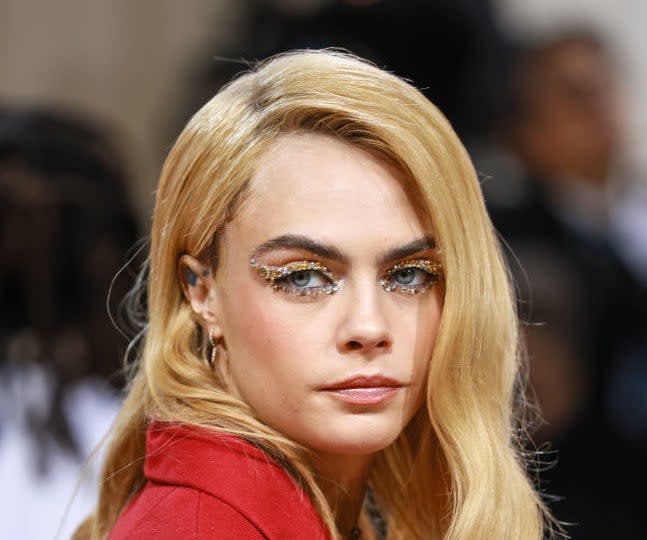 Cara Delevingne wearing jeweled eyeshadow