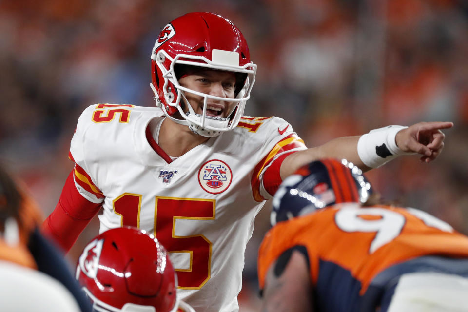 Kansas City Chiefs quarterback Patrick Mahomes (15) makes a call during the first half of an NFL football game against the Denver Broncos, Thursday, Oct. 17, 2019, in Denver. (AP Photo/David Zalubowski)