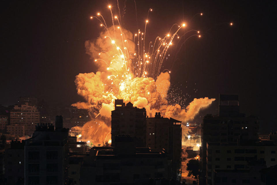 A missile explodes in Gaza City  (Mahmud Hams / AFP via Getty Images)