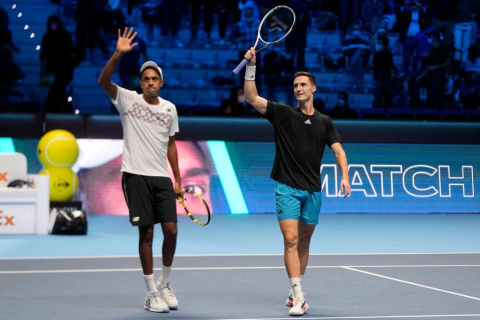 Joe Salisbury, right, and Rajeev Ram celebrate victory at the Nitto ATP Finals (Luca Bruno/AP) (AP)