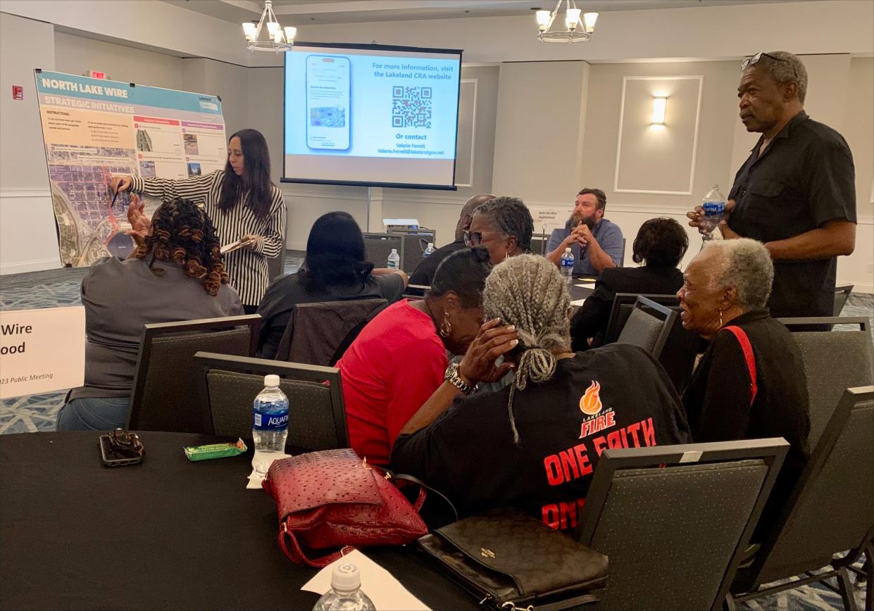 Claudia Ray of GAI Consultants discusses proposals for the Downtown West section of Lakeland during a public forum at the RP Funding Center on Tuesday night.