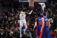 Brooklyn Nets guard Kyrie Irving (11) drives on the Detroit Pistons in the second half of an NBA basketball game in Detroit, Saturday, Jan. 25, 2020. (AP Photo/Paul Sancya)