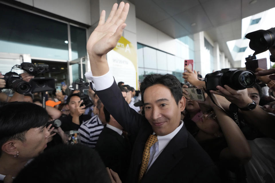 Former leader of Move Forward Party Pita Limjaroenrat, center, waves to his supporters as he leaves Constitutional Court in Bangkok, Thailand, Wednesday, Jan. 24, 2024. The court ruled Wednesday that popular politician Pita, who was blocked from becoming prime minister even though his party placed first in last year’s election, did not violate the election law and can retain his seat in Parliament. (AP Photo/Sakchai Lalit)