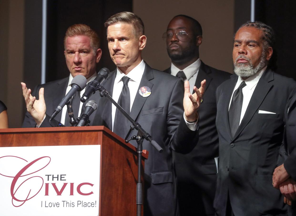 Walker family attorneys Mark DiCello, left, Bobby DiCello, Roddray Walker, and Rev. Mark Thompson address members of the media at the Knight Stage following the funeral service of Jayland Walker on Wednesday, July 13, 2022 in Akron, Ohio. 