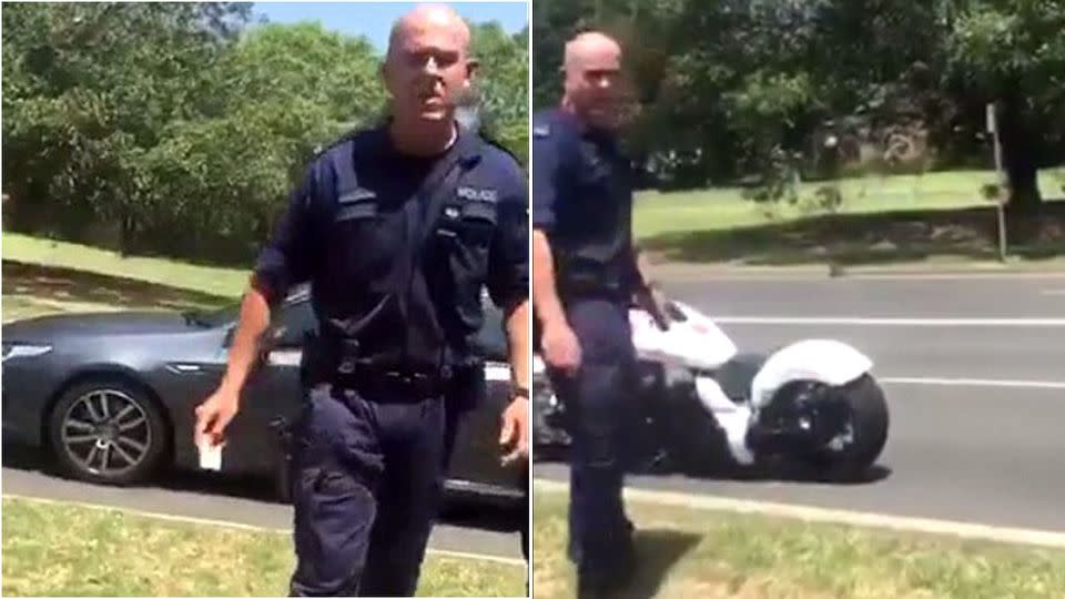 The officer was filmed dropping a license at his feet. Source: Facebook