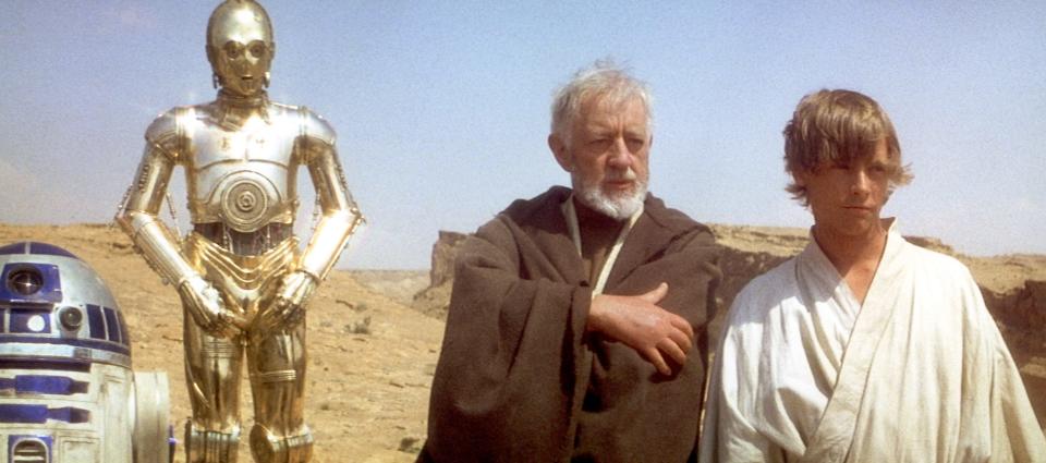 Anthony Daniels, Alec Guinness, and Mark Hamill on the set of "Star Wars: Episode IV — A New Hope."