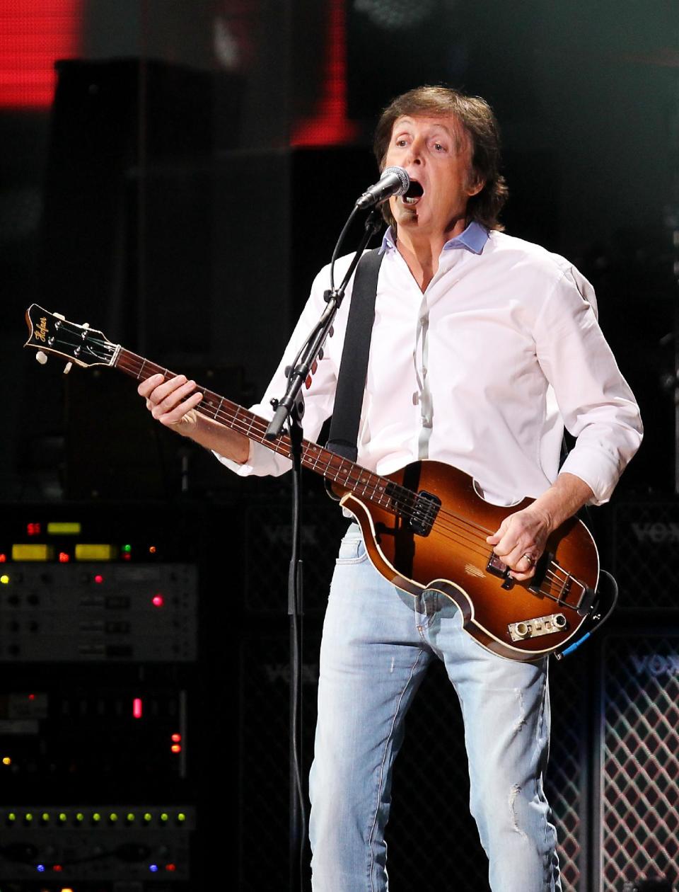 This image released by Starpix shows Paul McCartney at the 12-12-12 The Concert for Sandy Relief at Madison Square Garden in New York on Wednesday, Dec. 12, 2012. Proceeds from the show will be distributed through the Robin Hood Foundation. (AP Photo/Starpix, Dave Allocca)