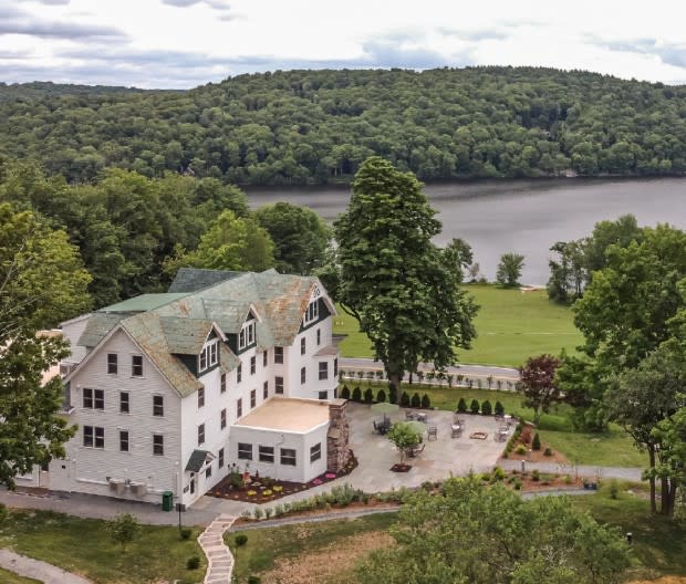<p>Lawrence Braun</p><p>The place to be at this rustic retreat overlooking its namesake lake is the <a href="https://www.kenozahall.com/bungalows" rel="nofollow noopener" target="_blank" data-ylk="slk:Kenoza Bungalows;elm:context_link;itc:0;sec:content-canvas" class="link ">Kenoza Bungalows</a>—idyllic cottages complete with their own porch swings, handsomely appointed interiors, fireplaces, and communal gardens with multiple terraces including bonfire pits, tea gardens and lounge areas. The Grand Lake Bungalow even has a pool table, a standalone tub, and two private decks.</p><p>Dating back to the turn of the 20th century, the Main Inn isn’t too shabby either. Some rooms boast views of Kenoza Lake, private balconies, and one even has original hardwood floors. From the Main Inn, you’re just a stairwell away from the property’s first-rate <a href="https://www.kenozahall.com/restaurant-bar" rel="nofollow noopener" target="_blank" data-ylk="slk:restaurant and bar;elm:context_link;itc:0;sec:content-canvas" class="link ">restaurant and bar</a>. On any given day, you can start your morning there with lakeside pancakes with blueberry compote and end it with trout almondine and chocolate mousse. Be sure to sit indoors for a meal, though, if you prefer to watch the Catskills wild weather systems (e.g. hail chased with sunshine) without getting pelted or soaked on the terrace. </p><p>Don’t leave the property without taking the signature “morgen lauf,” a guided Saturday morning walk through soul-restorative terrain with a pit stop at the <a href="https://www.kenozahall.com/hemlockspa" rel="nofollow noopener" target="_blank" data-ylk="slk:Hemlock Spa;elm:context_link;itc:0;sec:content-canvas" class="link ">Hemlock Spa</a> for a yoga class followed by a massage or herbal wrap. The guest rooms and bungalows all purposefully have no TV sets—the right move here. </p><p>[From $349, bungalows from $599; <a href="https://www.kenozahall.com/" rel="nofollow noopener" target="_blank" data-ylk="slk:kenozahall.com;elm:context_link;itc:0;sec:content-canvas" class="link ">kenozahall.com</a>]</p>