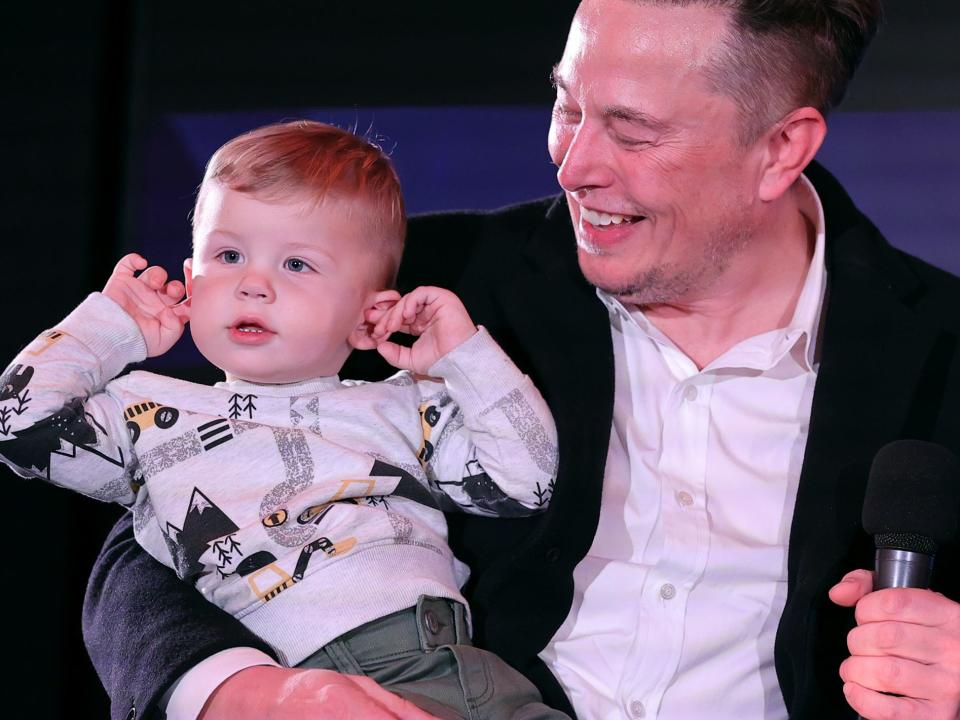 Elon Musk and son X Æ A-12 on stage TIME Person of the Year on December 13, 2021 in New York City.