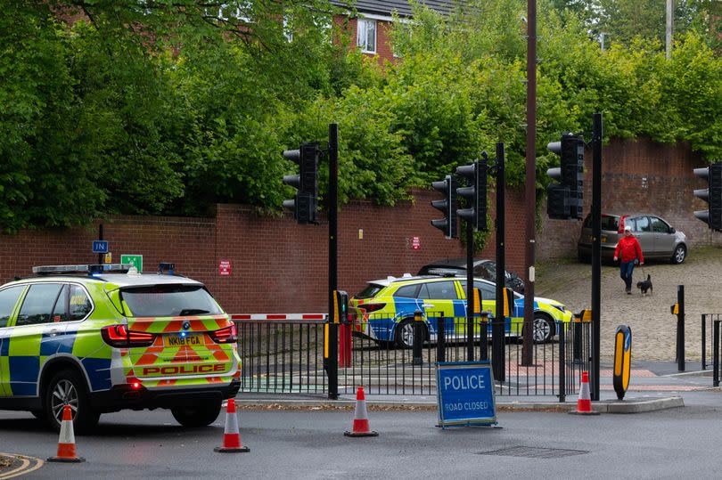 Police at the scene -Credit:Manchester Evening News