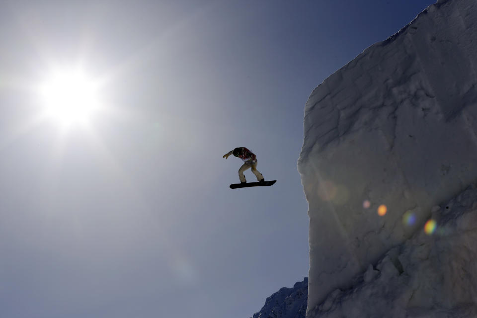 FILE - Shaun White of the United States takes a jump during a snowboard slopestyle training session at the Rosa Khutor Extreme Park, prior to the 2014 Winter Olympics, Feb. 4, 2014, in Krasnaya Polyana, Russia. A key part in the first episode of the documentary series “Shaun White: The Last Run” zeroes in on the exact moment White decided to try to make a living out of snowboarding instead of trying to make friends. The four-part series documenting White's life and career starts Thursday, July 6, 2023, on MAX. (AP Photo/Andy Wong File)