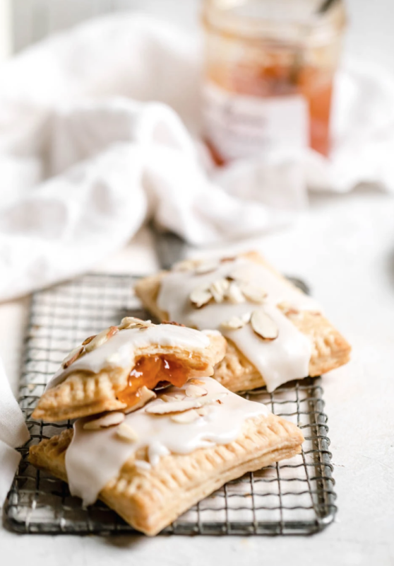 <p>Broma Bakery</p><p>Buttery, flaky dough filled with apricot jam, and topped with a glaze and sliced almonds.</p><p><strong>Get the recipe: <a href="https://bromabakery.com/homemade-apricot-almond-pop-tarts" rel="nofollow noopener" target="_blank" data-ylk="slk:Apricot Almond Pop Tarts;elm:context_link;itc:0;sec:content-canvas" class="link rapid-noclick-resp"><em>Apricot Almond Pop Tarts</em></a></strong></p>