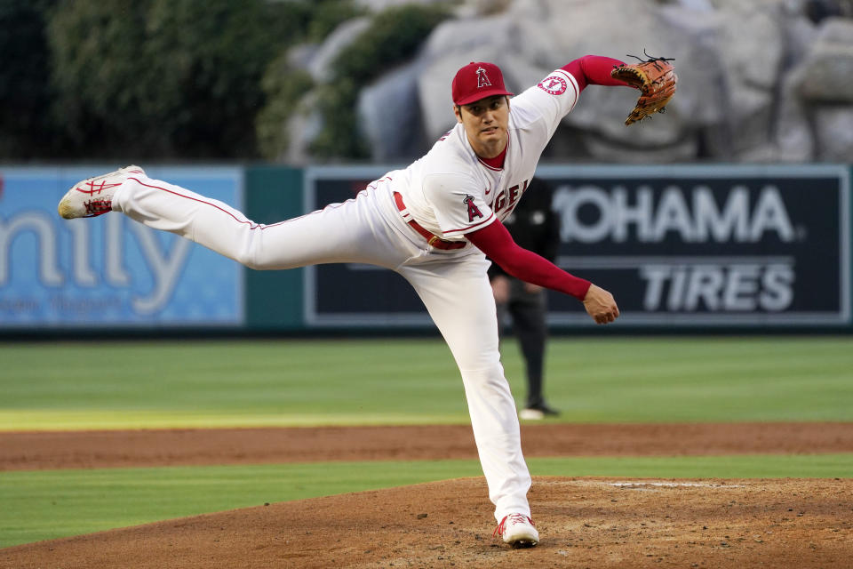 Los Angeles Angels starting pitcher Shohei Ohtani throws to the plate during the first inning of a baseball game against the Houston Astros Wednesday, July 13, 2022, in Anaheim, Calif. (AP Photo/Mark J. Terrill)