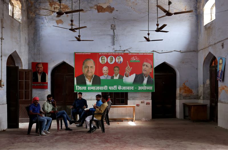 FILE PHOTO: Members of Samajwadi Party sit inside their party office, a day after India's general election results, in Ayodhya