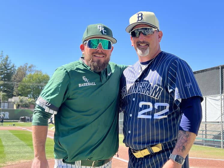 Coaches Matt Matuszak (Granada Hills) and Matt Mowry (Birmingham)