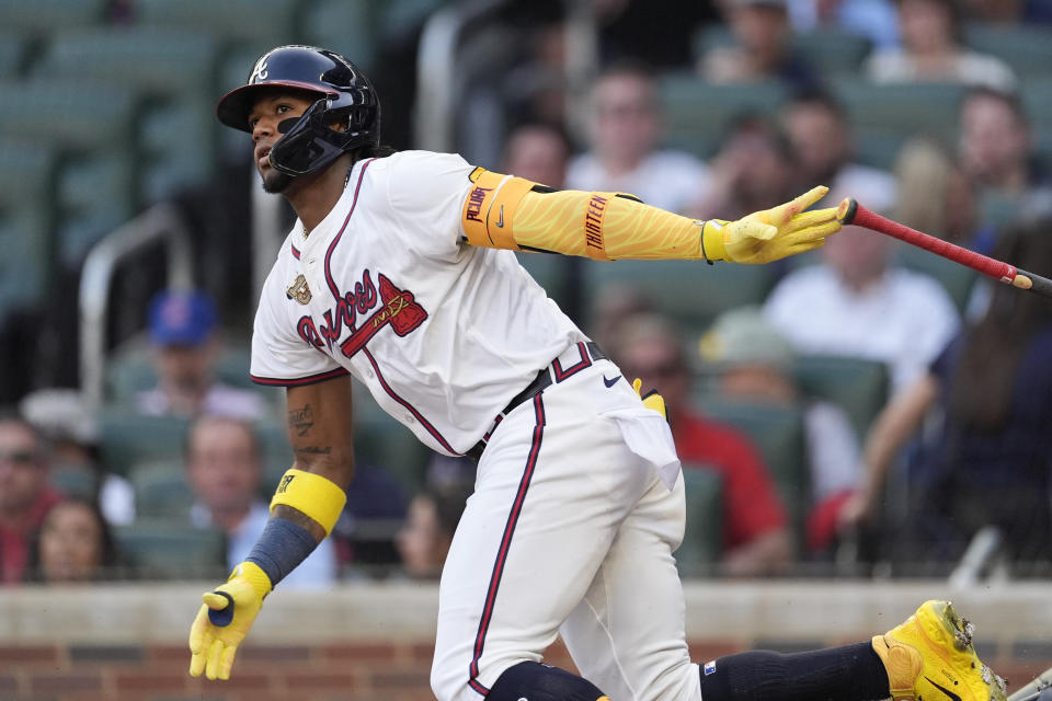Atlanta Braves' Ronald Acuña Jr. runs to first base after hitting q single in the first inning of a baseball game against the Boston Red Sox Tuesday, May 7, 2024, in Atlanta. (AP Photo/John Bazemore)