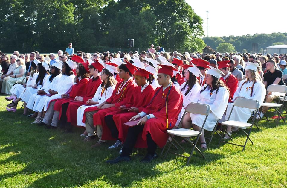 The Bishop Connolly High School class of 2023 listens to commencement speeches during their ceremony on Wednesday, May 31, 2023. Theirs is the last class to graduate from Bishop Connolly.