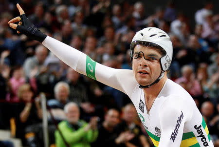 FILE PHOTO - Jack Bobridge of Australia celebrates winning the Men's Individual Pursuit at the UCI Track Cycling World Championships in Apeldoorn March 24, 2011. REUTERS/Jerry Lampen/File photo