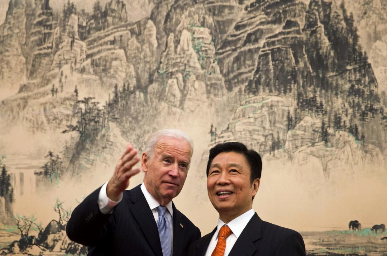 IMage: Vice President Joe Biden speaks with Chinese Vice Premier Li Yuanchao before a lunch in Beijing on Dec. 5, 2013.