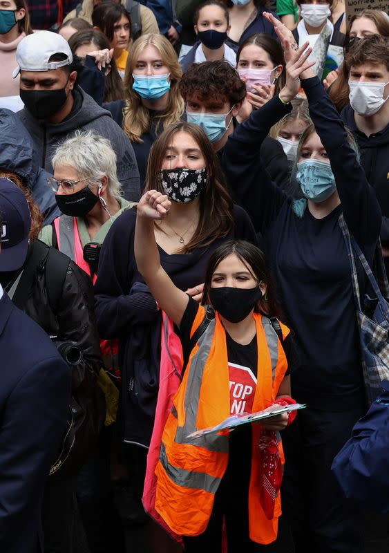 A 14-year-old activist participates in a rally demanding climate change action in Sydney