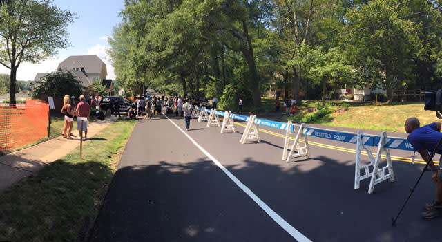 It is a somber day in Westfield, New Jersey, as the family of Bobbi Kristina Brown bury the daughter of Whitney Houston and Bobby Brown. Local law enforcement blocked off roads to accommodate those attending Bobbi Kristina's burial service at Fairview Cemetery. She will be laid to rest alongside her mother. The burial service lasted about an hour. <strong> WATCH: Nick Gordon Does Not Attend Bobbi Kristina Brown's Funeral </strong> ET Fans have also gathered at the cemetery to pay tribute to Bobbi Kristina. ET Her casket was first seen arriving to Whigham Funeral Home in New Jersey on Monday. A gold hearse was carrying the casket and was accompanied by a police escort. This was the same color as the hearse that carried Houston's body in 2012. The vehicle was followed by black limos carrying Pat Houston, Uncle Ray Watson and Bobbi Kristina's uncle, Tommy Brown. Splash News Bobbi Kristina's grandmother, Cissy Houston, was seen in the front seat of the hearse with her hands under her chin. She appeared to be praying, according to ET sources. ET ET <strong> WATCH: Bobbi Kristina's Aunt Leolah Brown Thrown Out of Funeral After Outburst </strong> Several attendees of the service were also seen outside the funeral home. Splash News On Saturday, the family held an intimate memorial service for Bobbi Kristina at St. James United Methodist Church in Alpharetta, Georgia. Many of Bobbi Kristina's relatives spoke at the service, attended by about 250 to 300 guests, including her uncle Tommy Brown and aunt Pat Houston, who sat near father Bobby Brown. Bobbi Kristina’s two best friends also took the podium together to give an emotional tribute to their friend. The program for the memorial service included a loving tribute from Bobby Brown, who stood at the end of the service with his hand resting on the closed casket, which was draped in pink, white and red flowers. A full page in the program featured a smiling picture of Bobbi Kristina, with the caption "I also will always love you. Love, Daddy," a reference to Houston's popular song. <strong> WATCH: Bobbi Kristina Brown's Intimate Memorial Service Focuses on Family, Music and Spirituality </strong> Bobbi Kristina died on July 26 at age 22 while in hospice care. Her death came months after she was found unresponsive in her Georgia home.