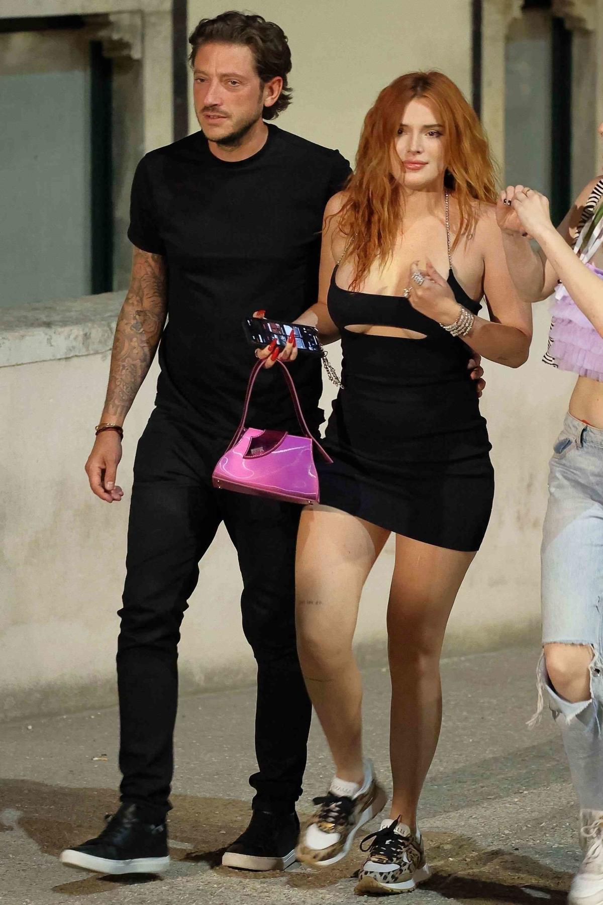 Bella Thorne Enjoys Date Night with Fiancé Mark Emms in Italy