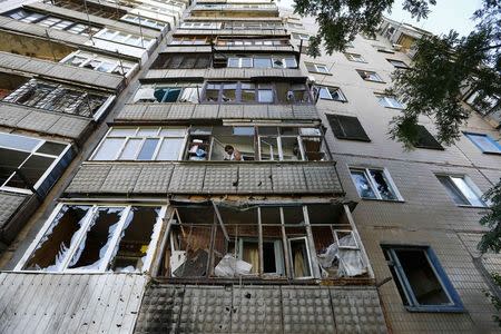 A general view of an apartment block damaged by shelling in Slaviansk in eastern Ukraine June 29, 2014. REUTERS/Shamil Zhumatov