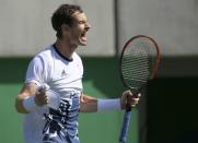 2016 Rio Olympics - Tennis - Semifinal - Men's Singles Semifinals - Olympic Tennis Centre - Rio de Janeiro, Brazil - 13/08/2016. Andy Murray (GBR) of Britain celebrates after winning match against Kei Nishikori (JPN) of Japan. REUTERS/Toby Melville