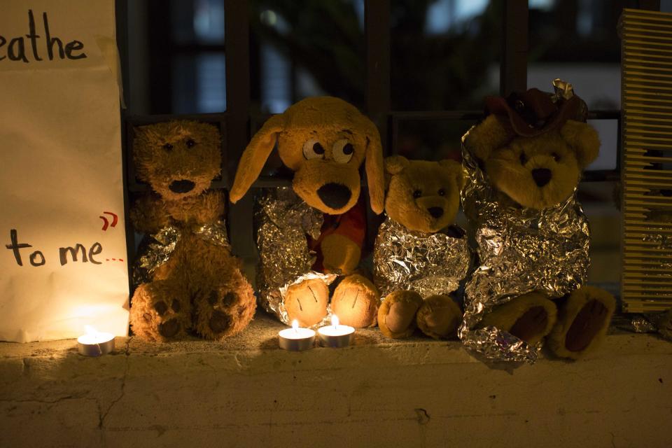 Stuffed toy animals wrapped in aluminum foil representing migrant children separated from their families are displayed in protest in front of the United States embassy in Guatemala City, June 20, 2018. Bowing to pressure from anxious allies, President Donald Trump abruptly reversed himself Wednesday and signed an executive order halting his administration’s policy of separating children from their parents when they are detained illegally crossing the U.S. border. (AP Photo/Luis Soto)