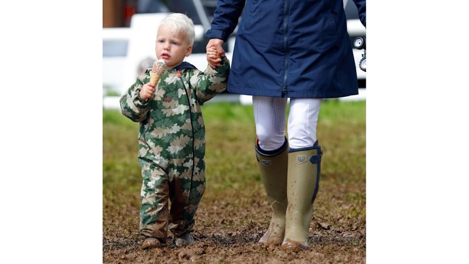 Lucas Tindall seen eating an ice cream as he and his mother Zara Tindall attend day 2 of the 2023 Festival of British Eventing at Gatcombe Park 