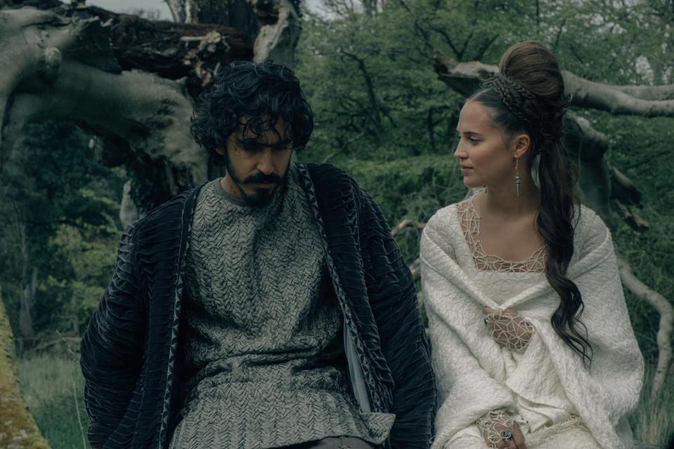 Gawain (Dev Patel) has a chat with Lady Bertilak (Alicia Vikander) in "The Green Knight."