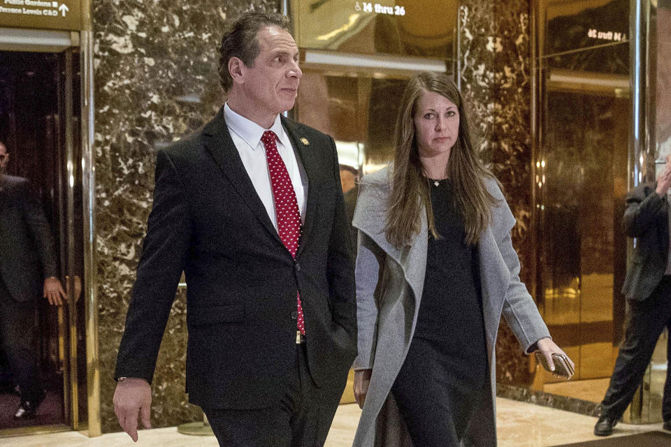 FILE — In this Jan. 18, 2017 file photo, New York Gov. Andrew Cuomo, accompanied by his chief of staff Melissa DeRosa, walks to talk with members of the media after meeting with President-elect Donald Trump at Trump Tower in New York. De Rosa, Cuomo's top aide, told top Democrats frustrated with the administration's long-delayed release of data about nursing home deaths that the administration "froze" over worries about what information was "going to be used against us," according to a Democratic lawmaker who attended the Wednesday, Feb. 10, 2021 meeting and a partial transcript provided by the governor's office. (AP Photo/Andrew Harnik, File)