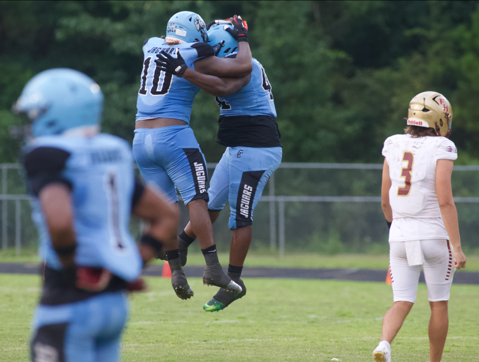 Gadsden County junior defensive end Jeramiah Mccloud celebrates a defensive play in a game between Florida High and Gadsden County on Sep.15, 2023, at Gadsden County High School. The Seminoles won, 45-22.