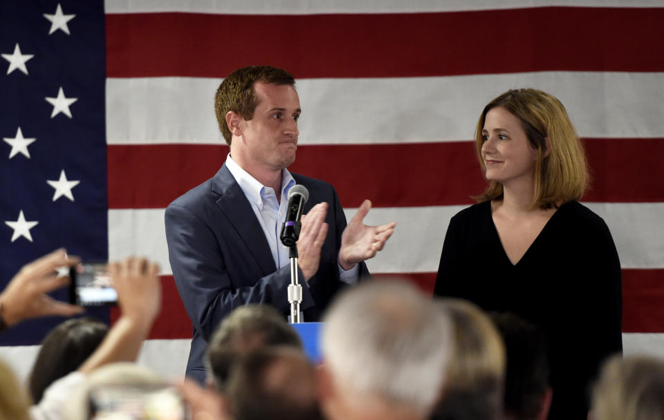 With his wife, Laura by his side, Democrat Dan McCready greets supporters after losing a special election for United States Congress in North Carolina's 9th Congressional District to Republican, Dan Bishop, Tuesday, Sept.1 0, 2019, in Charlotte, N.C. (AP Photo/Kathy Kmonicek)