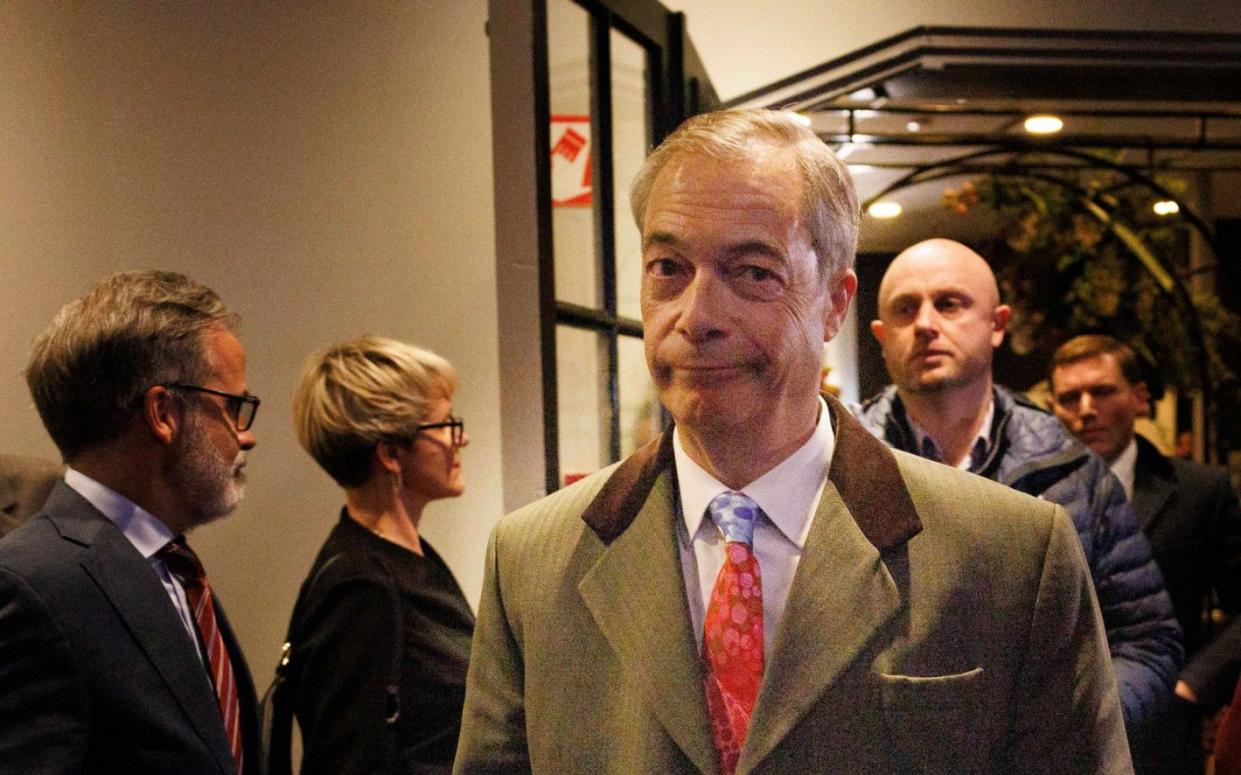 Former Leader of the Brexit Party Nigel Farage arrives to attend The National Conservatism Conference in Brussels