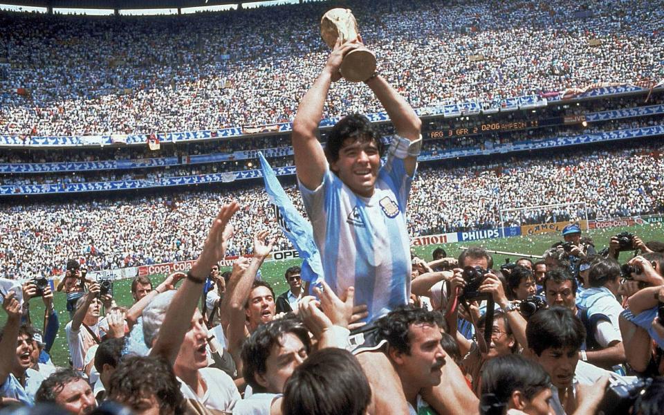 Diego Maradona holds up the World Cup trophy after Argentina's 3-2 victory over West Germany at Azteca Stadium in Mexico City - Harry Kane and Jude Bellingham are the key to England winning the Euros, not Gareth Southgate