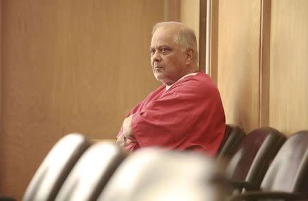 Krishna Maharaj sits in Circuit Court during a legal hearing in Miami, Florida, November 10, 2014. REUTERS/ Chris Bott/Pool