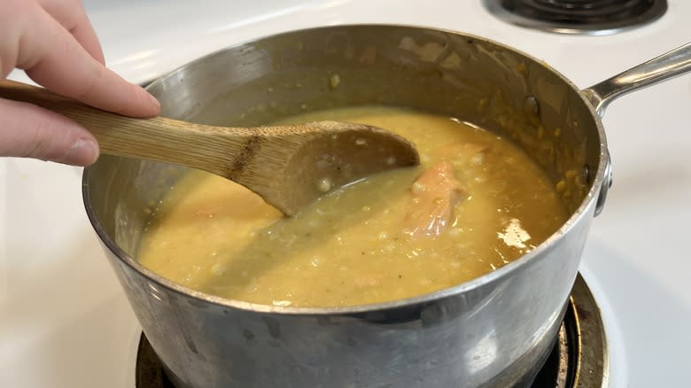 stirring salmon corn chowder