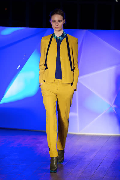 <b>LFW AW13: Matthew Williamson </b><br><br>The designer included mustard yellow suits in his collection.<br><br>© Getty