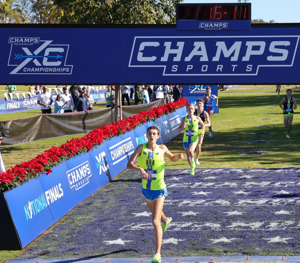 Hilliard Davidson senior Connor Ackley crosses the finish line in the Champs Sports Cross Country Championships on Dec. 10 in San Diego. He finished fifth of 39 runners in 15 minutes, 11.8 seconds.