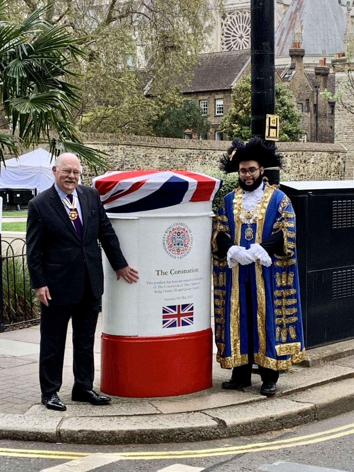 The Lord Mayor of Westminster and the Representative Deputy Lieutenant of Westminster, Kevin Traverse-Healy pictured standing next to a coronation post box in Westminster