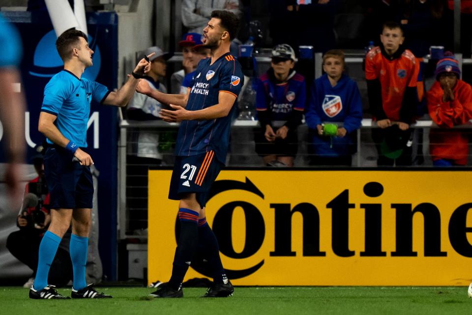 FC Cincinnati defender Matt Miazga (21) argues with the referee Lukasz Szpala in the second half of the MLS match at TQL Stadium in Cincinnati on Saturday, Oct. 1, 2022. Chicago Fire defeated FC Cincinnati 3-2.