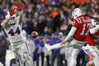 Buffalo Bills linebacker Tyler Matakevich (44) nearly block a punt by New England Patriots' Michael Palardy during the first half of an NFL football game, Thursday, Dec. 1, 2022, in Foxborough, Mass. (AP Photo/Michael Dwyer)