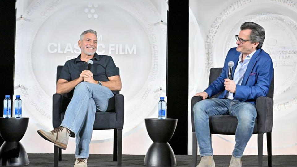 George Clooney and Ben Mankiewicz speak onstage at the screening of 'Ocean's Eleven' during the 2023 TCM Classic Film Festival